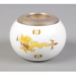 A Meissen silver mounted porcelain match striker decorated in yellow with stylised dragons.