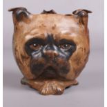 An Austrian cold painted bronze novelty three sided ash tray, depicting the faces of an owl, a cat