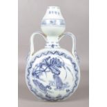 A 19th century Chinese blue and white moon flask, bearing four character Yongle mark. Painted in