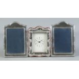 A pair of silver framed mirrors, together with matching silver framed quartz clock. Assayed for