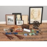 A box of miscellaneous. To include two portrait carvings, an Arabian Jambiya knife and belt