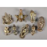 Eight brass door knockers. Includes Mr Pickwick, animals, Masonic example etc.