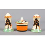 A Newport Pottery Clarice Cliff Muffineer three piece cruet set. Decorated in the Red Trees And