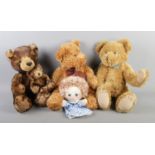 Three teddy bears and a Merrythought hand puppet. Including Harrods example, etc.