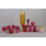 An assortment of coloured and controlled bubble glass. To include cranberry coloured glasses, and