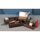 Three vintage crates containing a variety of collectables, to include Anglepoise lamp, cased
