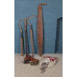 A collection of vintage tools, to include Sorby plane, vice, scythe and bag of spanners.