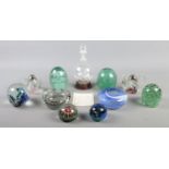 A collection of decorative glassware, containing paperweights, including millefiori examples and