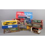 A selection of eight die-cast vehicles in boxes. To include two Gilbow 1st editions trucks, a