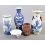 A collection of Chinese vases and a bowl. Includes prunus blossom example, sleeve vase etc.