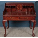 A carved Mahogany fitted writing desk with ball & claw supports.(103cm width 106cm height 61cm