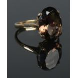 A 9ct Gold Smokey Quartz dress ring. Size M. Total weight: 3.14g.