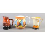 Three decorative jugs, to include West German style with 'lava' decoration. Tallest 19cm.