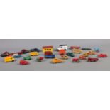 A collection of Dinky & Lesney die cast vehicles. To include Dinky Toys - Austin Taxi, Royal Mail