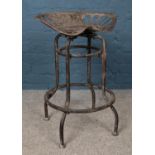 A Pan and Botany metal tractor seat bar stool. 66cm high.