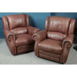 A brown leather three piece suite. Comprising of sofa and two reclining arm chairs.