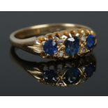 An antique 18ct Gold Sapphire and Diamond ring. Size OÂ½. Total weight: 3.25g.