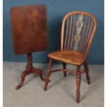 A Windsor chair with crinoline stretcher, along with a mahogany tilt top table. Chair with signs