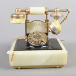 A vintage onyx telephone.