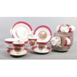 A German porcelain tea set, decorated with neo-classical figures in Angelica Kauffmann style. To