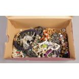 A box of beaded necklaces.