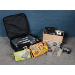 A box and bag of photographic equipment and projectors. To include a boxed Pentax ESP10 60s, a