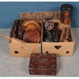 Two boxes of treen. Includes mother of pearl inlaid box, plaque, carvings etc.