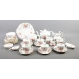 A thirty two piece Royal Crown Derby part tea set. Decorated in the 'Derby Posies' design. To