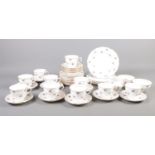 Over forty pieces of Colclough Ditsy Rose pattern tea set. To include cups, saucers, milk and