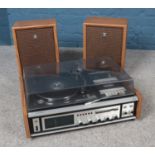 A Sanyo stereo system with two speakers. Model No. G2611KL.