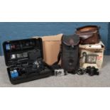 A quantity of photograph equipment. To include a Canon Dial 35-2 35mm Compact Camera, Panasonic