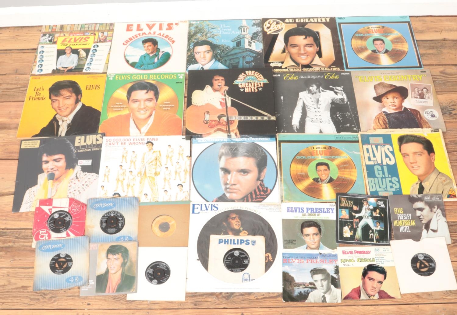 A large collection of Elvis single and album vinyl records, to include Greatest Hits, Elvis Gold,