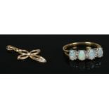 A yellow metal (stamped 925) opal and diamond dress ring, size N, (1.37g) together with 9ct Gold and