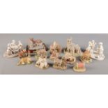 A collection of composite and ceramic models. Includes Lilliput Lane, David Winter, Regency Fine