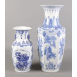 Two decorative blue and white Oriental vases. Tallest 46.5cm.