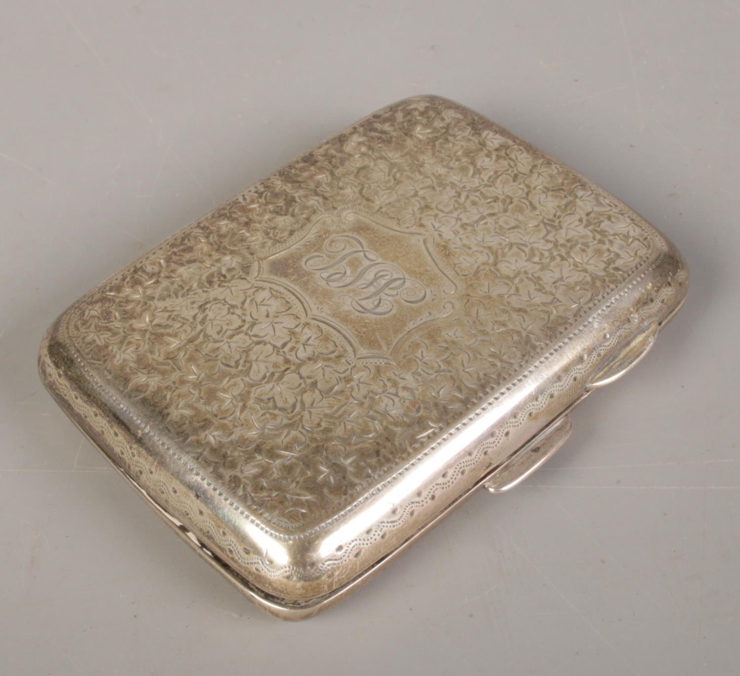 A silver cigarette case. Assayed Birmingham 1897. 70g.