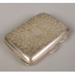 A silver cigarette case. Assayed Birmingham 1897. 70g.