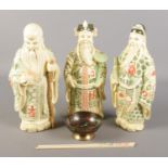 Three Past Times oriental figures along with an enamelled brass dish and pair of chopsticks.