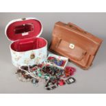 A box containing a Pixie vanity case with contents of costume jewellery, along with a vintage