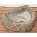 A carved stone sink.