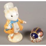 A Royal Crown Derby paperweight formed as a ladybird along with a Beatrix Potter Border Fine Art
