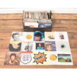 A large box of assorted single vinyl records. To include Blondie, Abba, Ultravox, Paul Young, Olivia
