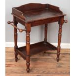 A small carved mahogany washstand. Raised on turned supports. (80cm x 73cm)