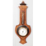 A carved mahogany Aneroid banjo barometer with inlaid decoration.