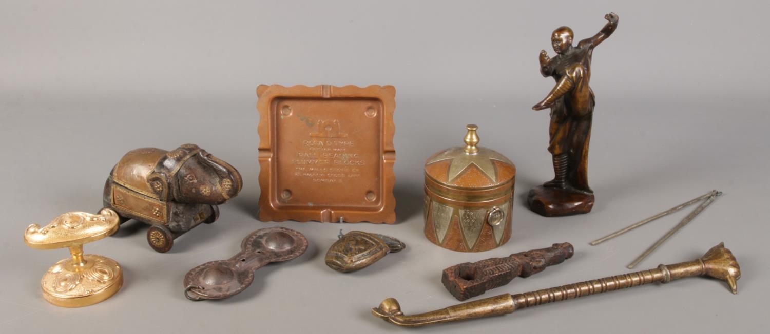 A collection of assorted metalwares, to include copper ashtray, novelty elephant and twin handled