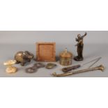 A collection of assorted metalwares, to include copper ashtray, novelty elephant and twin handled