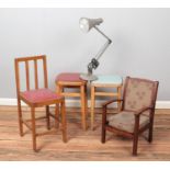 A pair of vintage stools along with a similar chair, a child's chair and an angle poise lamp.