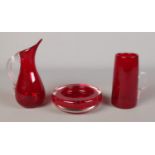 Three pieces of red Whitefriars style glass, including tall tankard and ashtray.