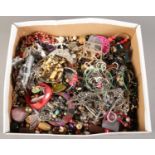 A box of costume jewellery. Including beads, bangles, necklaces, bracelets, etc.