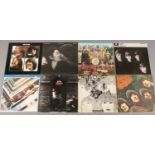Eight Beatles and John Lennon L.P records. Including Revolver, Sgt Pepper, Let it Be, etc.